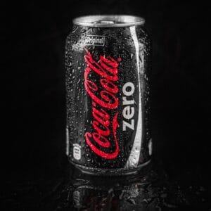 coca cola zero can on black surface